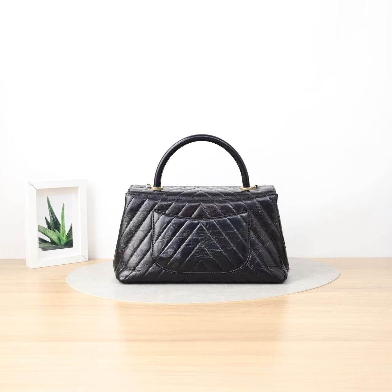 Chanel Coco top handle medium handbag
